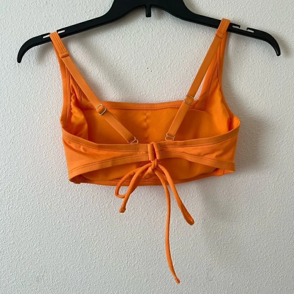 Kona Sol orange swimming top size D/DD